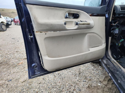 GUARNECIDO PUERTA DELANTERA IZQUIERDA